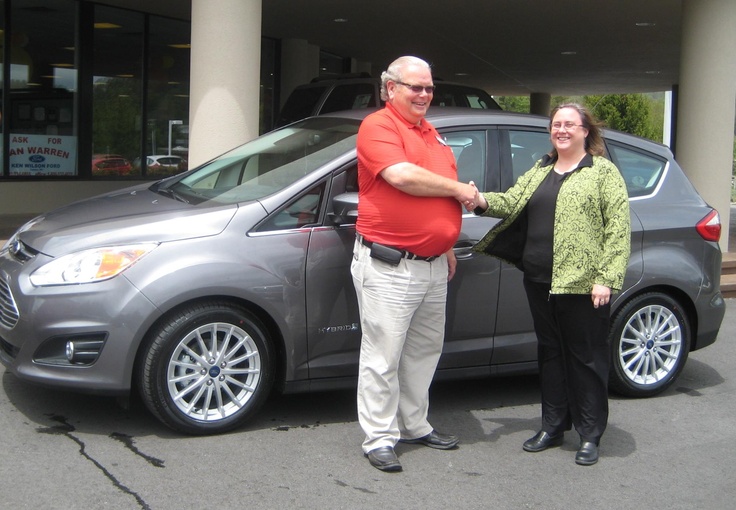 Car seller with customer